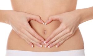 woman holding slim stomach