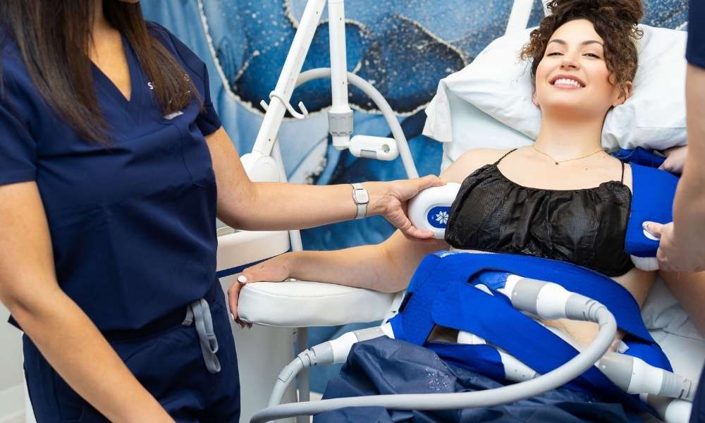 Woman undergoing a CoolSculpting fat reduction treatment at our San Ramon studio.